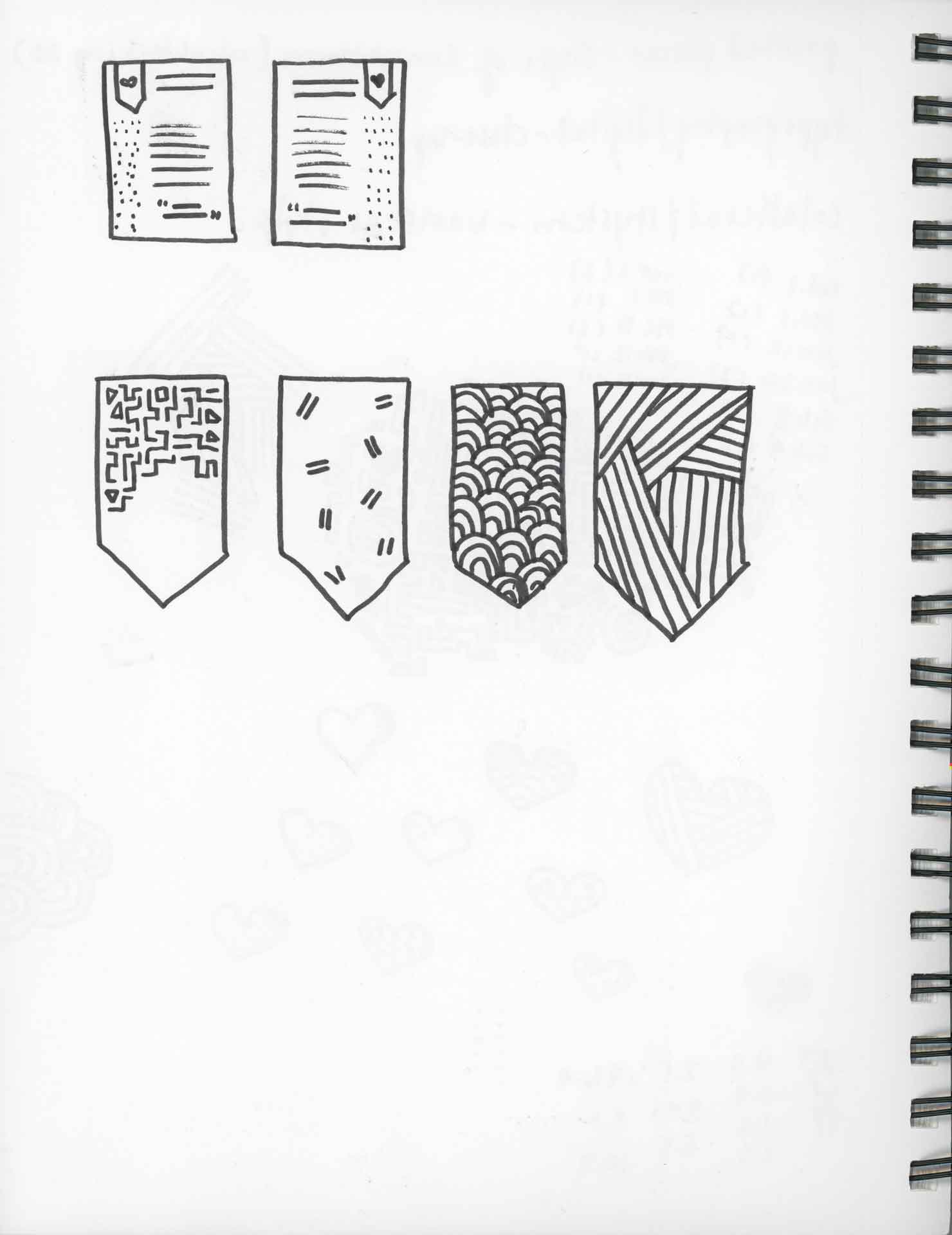 Single page of sketch book with sketches of patterned banners