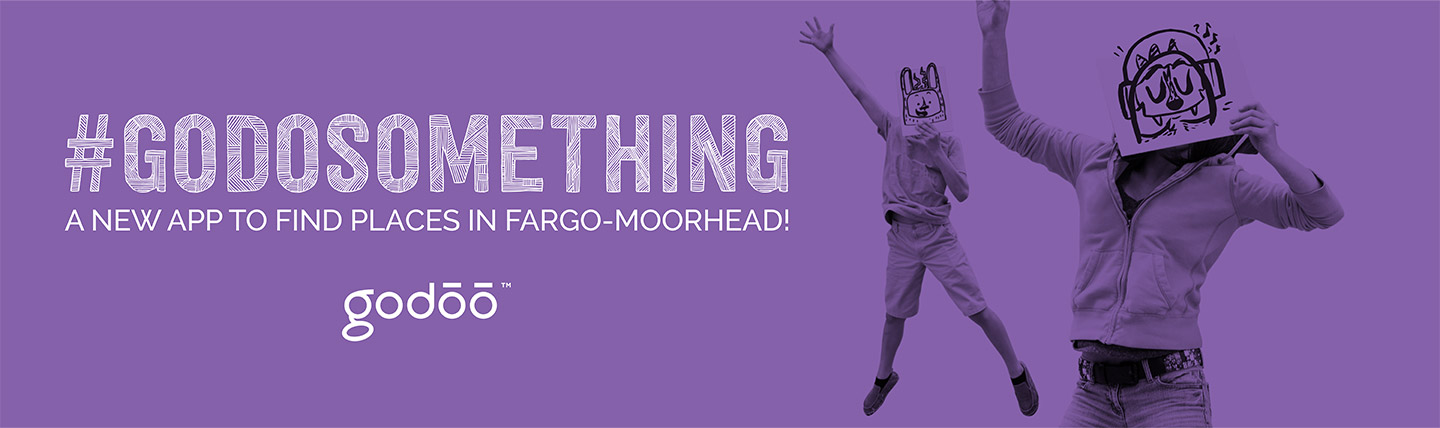 Ad reading #godosomething a new app to find places in Fargo-Moorhead and a photo of two kids holding cute monster signs