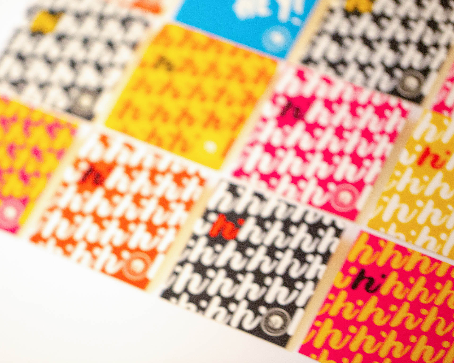 A grid of colorful square cards on a white background