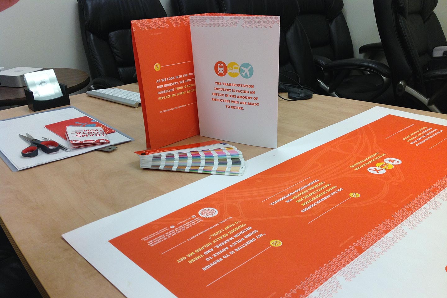 Color swatches and printing proofs of transportation brochure and poster