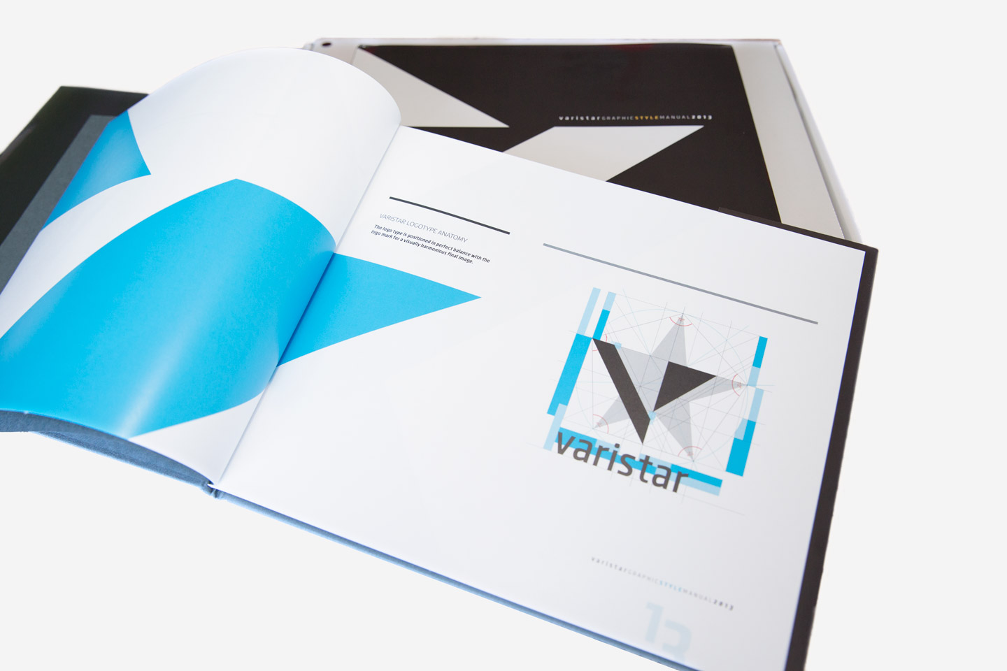 Varistar brand guideline manual open to a page showing the logo in blue and black